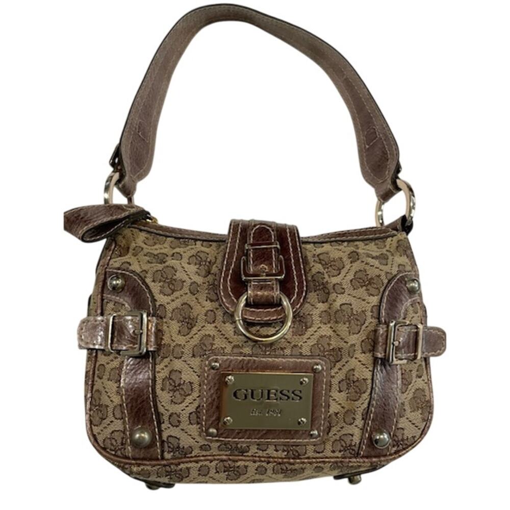 Guess Vintage canvas shoulder bag with logo in front.